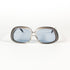 Lunettes de soleil vintage Lizon vue de face, monture transparente et verres bleus
