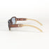Lunettes Gucci GG 2475/S vues de dessus, branches croisées