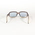 Lunettes Gucci GG 2475/S vues de dessus, branches croisées