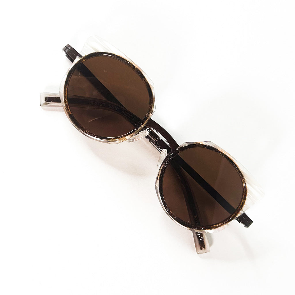 Lunettes JF Rey JF2720 vues de dessus, branches en acétate et métal croisées, monture ronde transparente
