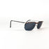 Vue arrière des lunettes Carrera 5508, branches écartées, verres polygonaux foncés, pont de nez en métal argenté