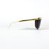Lunettes de soleil Nouvelle Vague Sally P1 – vue frontale, barre supérieure dorée, verre unique teinté brun, design neuf collection années 2000