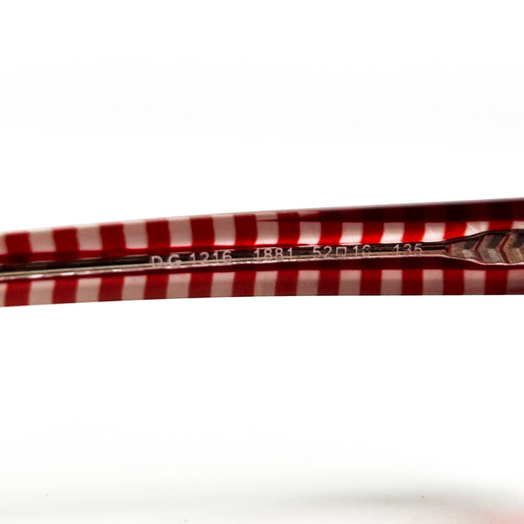 Monture Dolce & Gabbana DG 1216 1881 – motif vichy rouge, logo D&G visible sur la branche.