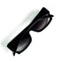 Lunettes YSL vintage noires pliées vues de dessus