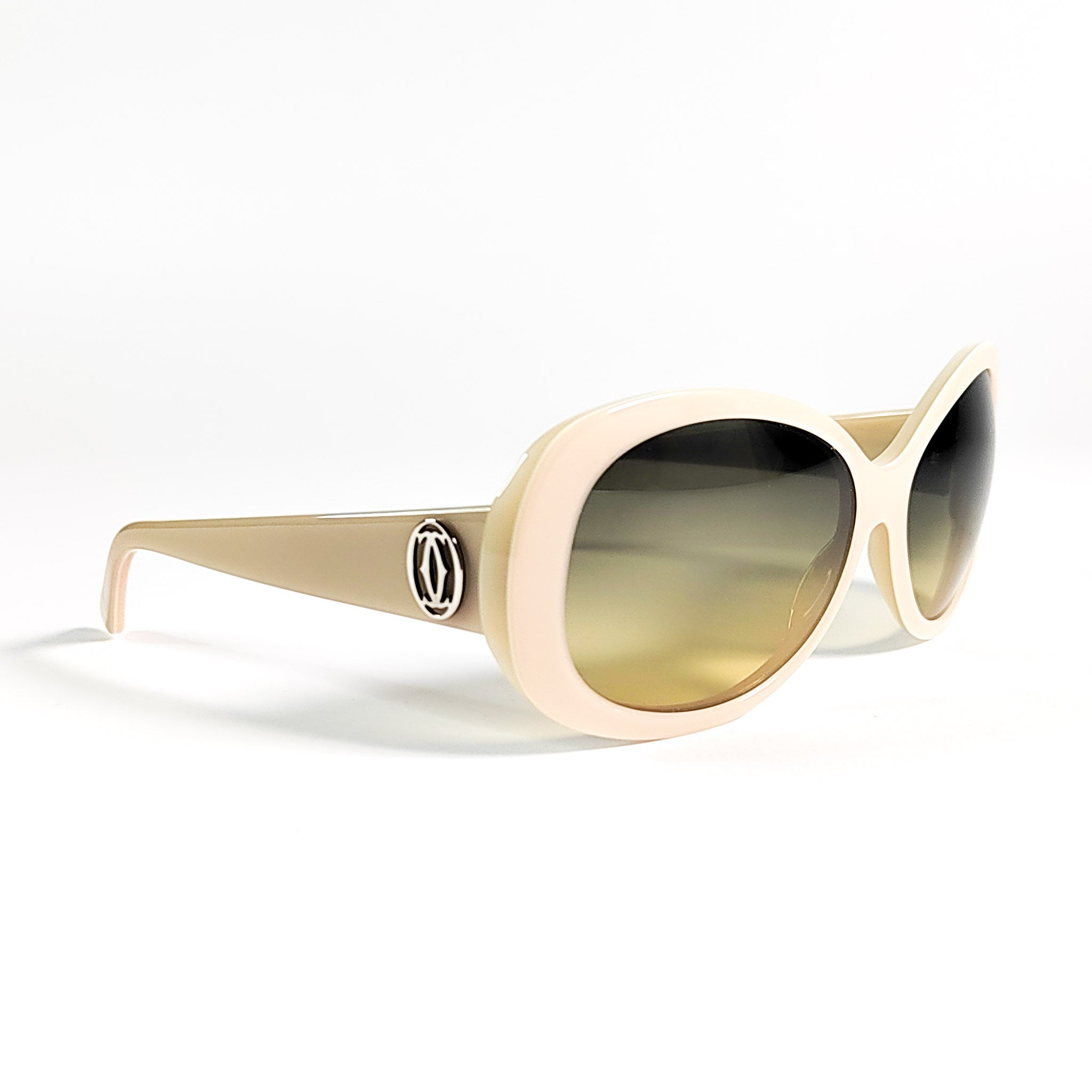 Cartier vintage ivoire vue 3/4 avant, logo double C palladié visible sur la branche