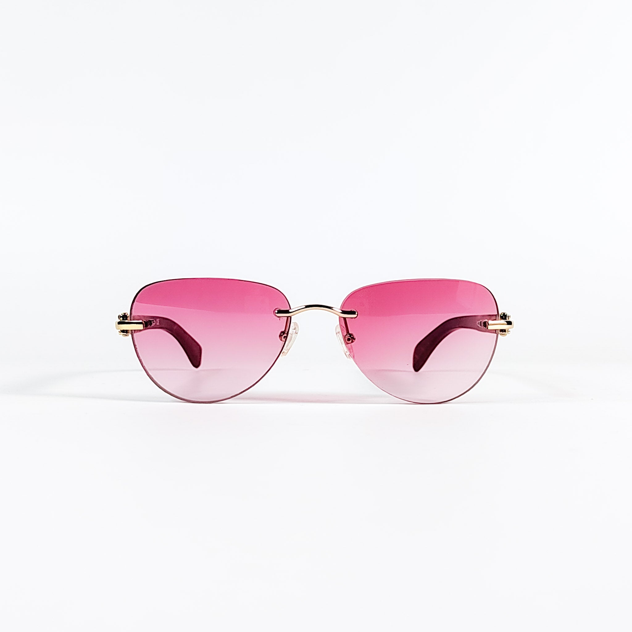 Lunettes de soleil vintage Porta Romana 1961 100R, vue de face, verres roses dégradés et pont métal doré
